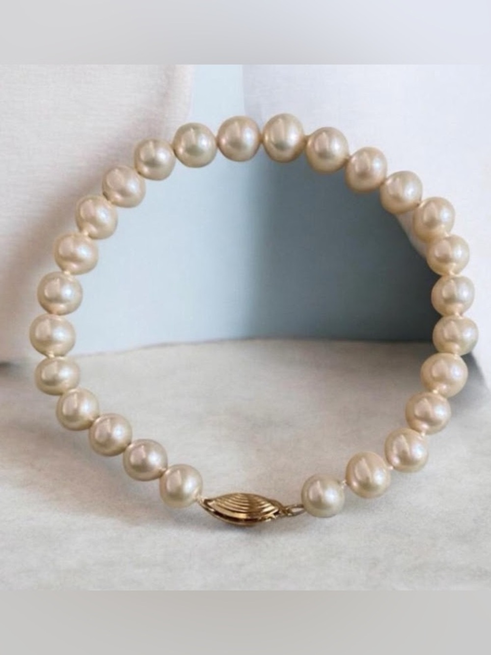 Cultured freshwater Handknotted pearls 14k yellow gold clasp bracelet